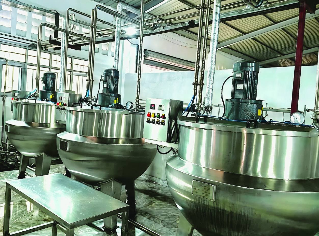 Jacketed mixing kettles on the production floor