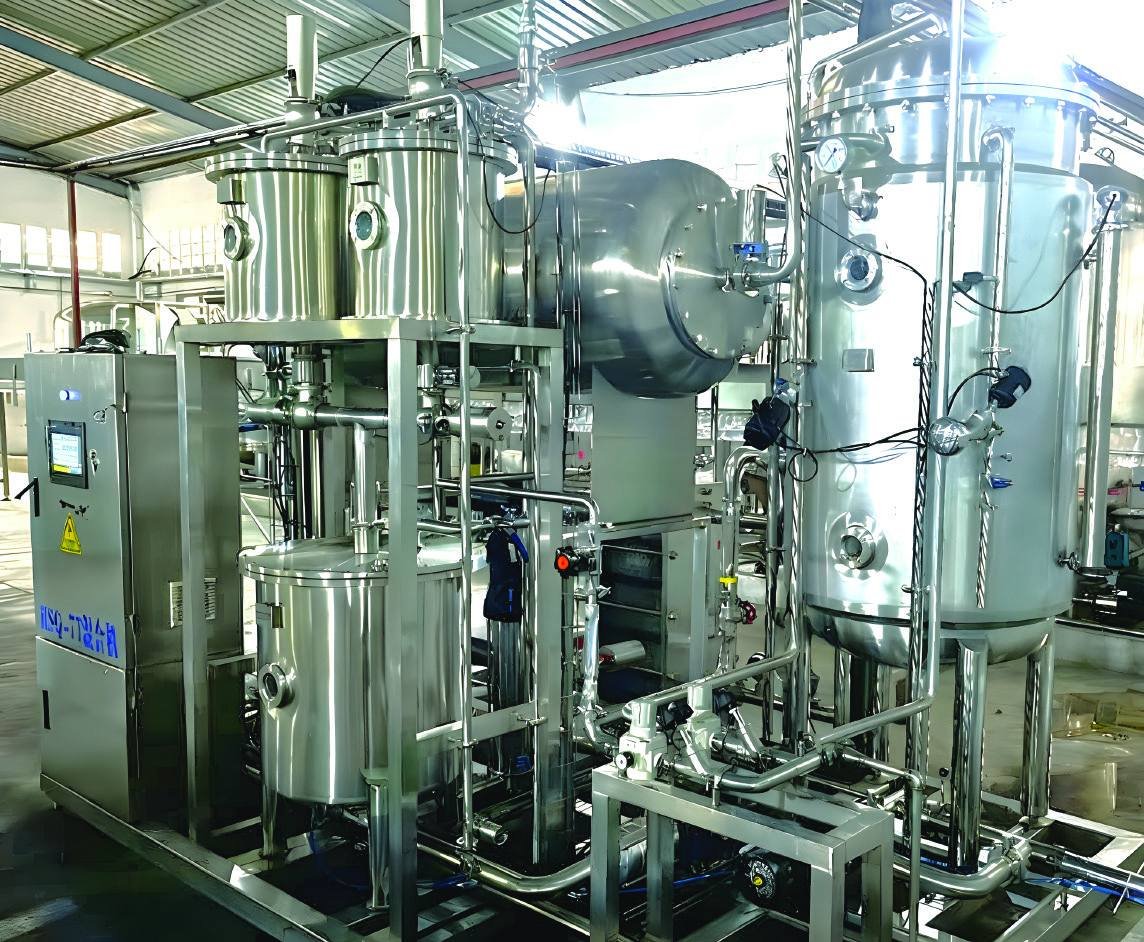 Syrup room with stainless steel tanks and filtration